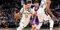 Nov 15, 2025; Milwaukee, Wisconsin, USA;  Milwaukee Bucks guard Ryan Rollins (13) drives towards the basket during the first quarter against the Los Angeles Lakers at Fiserv Forum. Mandatory Credit: Jeff Hanisch-Imagn Images